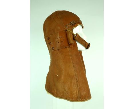 A WW1 ROYAL FLYING CORPS/AIR FORCE COWL PATTERN LEATHER FLYING HELMET Partially chamois-lined, the fur elements lacking, with