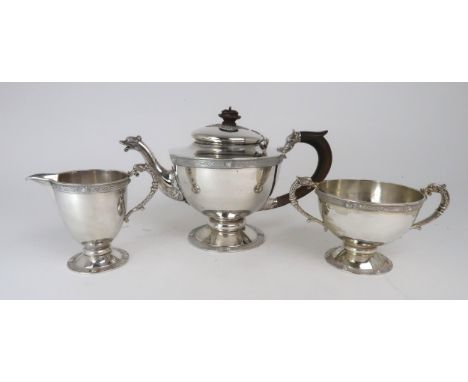 A GEORGE V THREE PIECE IRISH SILVER TEA SERVICE by&nbsp;George Edward &amp; Sons, Dublin 1923, of baluster form, with bands o