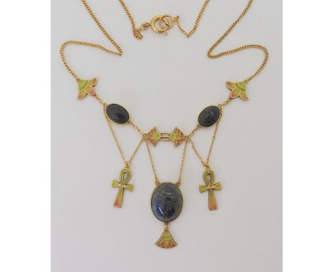 AN EGYPTIAN REVIVAL NECKLACE made in gilded white metal, with plique a jour enamel ankhs and lotus flowers, further set with 