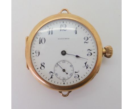 A CANADIAN 14K GOLD CONVERTED FOB WATCH into an early wristwatch, made by Ryrie Brothers Toronto, with a white enamel dial, w