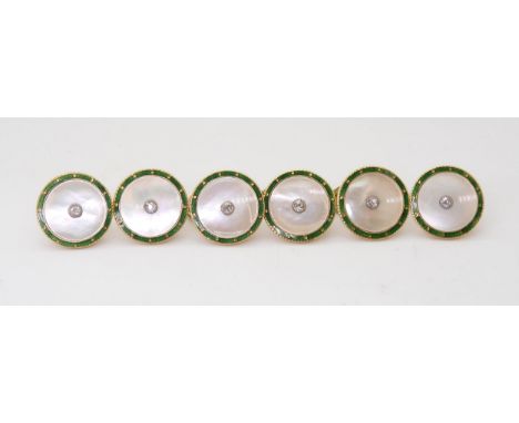 A SET OF 18CT GOLD DRESS STUDS set with old cut diamonds and mother of pearl with a green enamel edge, all with yellow metal 