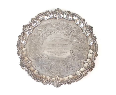 A GEORGE III SILVER SALVER by William Bennett, London 1807, of shaped circular form, with a cast acanthus scroll border, with