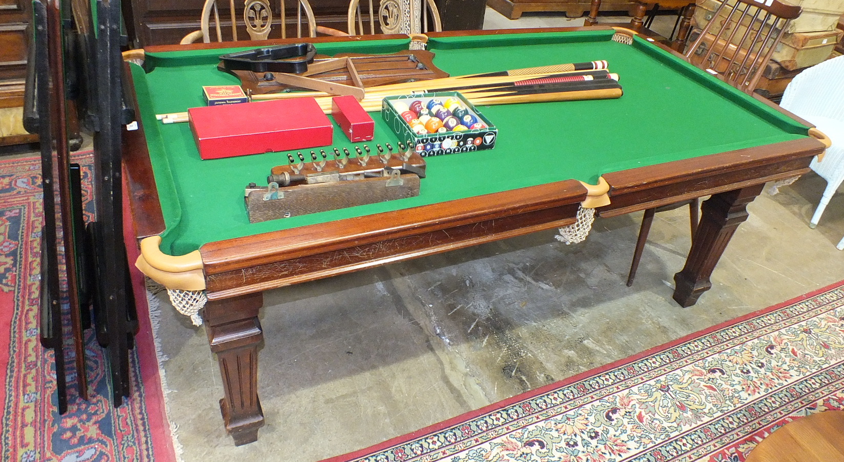 An early20th century mahogany slatebed quartersize snooker table