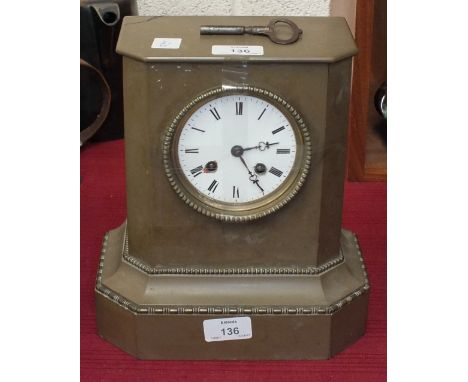 A brass striking mantel clock with white enamel dial and Roman numerals, 25.5cm high, af.