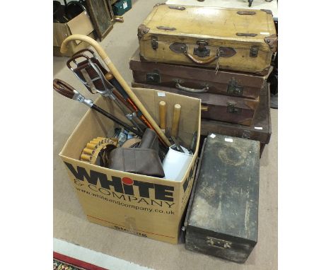 A metal studded leather trunk, 84cm wide (af), other luggage, various metal door fittings, a shooting stick and other items.