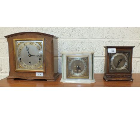 An Elliott walnut cased Westminster/Whittington chiming mantel clock, 23cm high, an Elliott white onyx mantel time piece, 14c