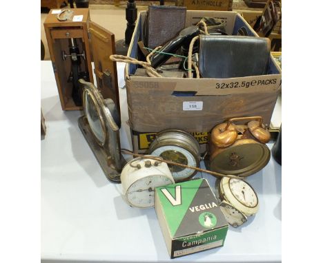 Various vintage cameras, mantel clocks and miscellanea.