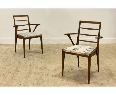 McIntosh of Kirkcaldy, a pair of mid century carver dining chairs, with ladder backs, upholstered seat pads and raised on tap