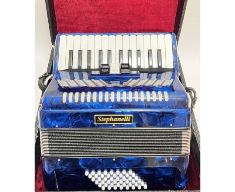 A blue Stephanelli 48 bass accordion accompanied by a fitted hard case