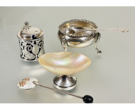 A collection of table salts sellers to include a Birmingham silver mounted shell salt H x 3.5cm , a London silver George III 