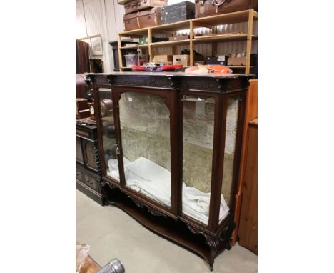 Early 20th century Mahogany Breakfront Display Cabinet by Maple &amp; Co, the shaped top over a blind fretwork carved frieze 