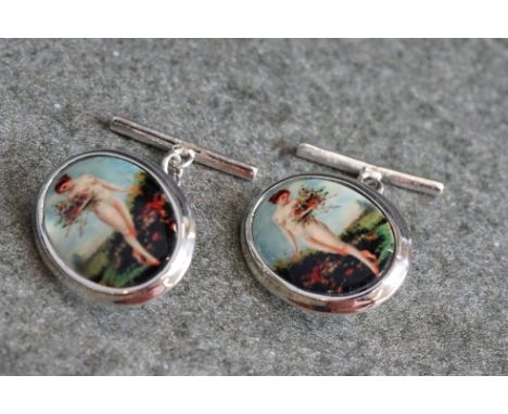 Pair of silver and enamel set cufflinks, with enamel panels depicting nude figures 