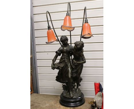 After Moreau, Large Cast Metal Bronzed Table Lamp in the form of Two Maidens, the three branches with mottled glass shades, r