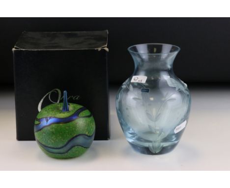 A boxed Okra apple paperweight together with a blue glass vase with floral decoration.