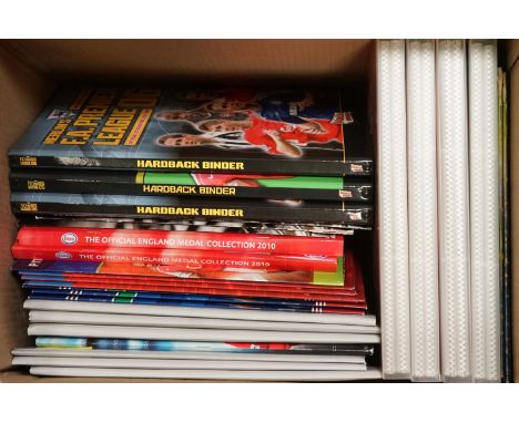 A large collection of Merlin &amp; Panini football sticker albums and trading card albums with contents. 