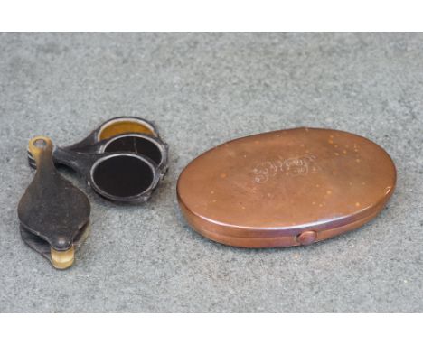 19th century Copper Oval Snuff Box, 9cms long together with a Horn Loupe with Three Coloured Glass Lens 