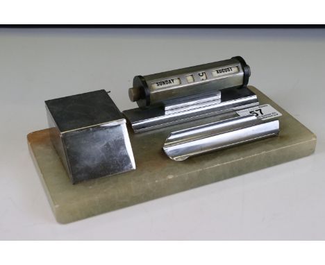 1930's Chrome Standish comprising desk calendar, pen tray and inkwell raised on a green onyx base, 24cms long 