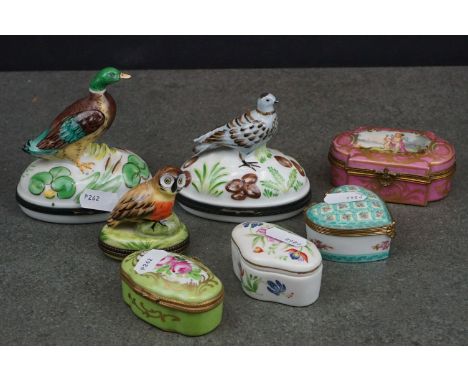 A collection of trinket boxes to include Limoges Paint Main and Sevres style examples. 