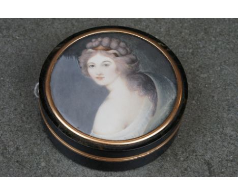 An antique tortoiseshell and yellow metal box with decorative miniature portrait to the lid. 