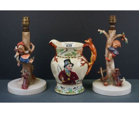 Pair of Goebel Hummel Table Lamps in the form of Children climbing trees, 30cms high together with Crown Devon Fieldings John