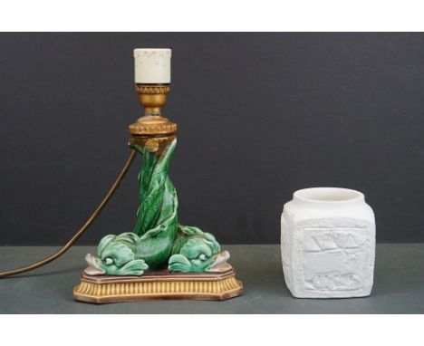 A Wedgwood majolica dolphin lamp base together with a Troika style vase. 