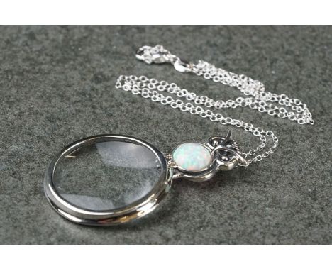 Silver, opal set, owl shaped pendant magnifying glass, on silver chain 