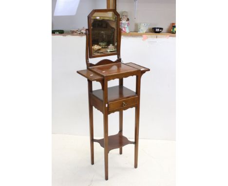 Edwardian Gentleman's Mahogany Tall Washstand with a swing mirror, the square top flanked by two overhanging shelves above a 