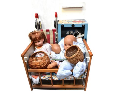 A quantity of vintage children's toys to include a doll's high chair, a McLaren play buggy for doll, a wooden cooker with a q