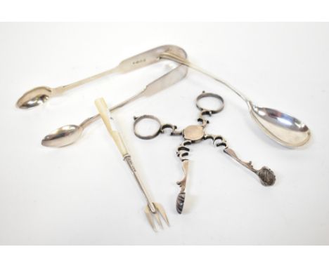 A small mixed lot of silver, comprising a pair of sugar nips, Josiah Williams &amp; Co, Exeter 1864, a pair of sugar tongs be