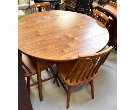 A set of four stick-back dining chairs raised on turned tapering cross stretchered supports and a drop-leaf table (5).