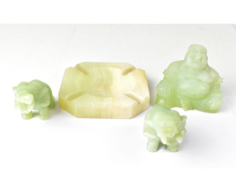 A green jade-effect laughing Buddha, height 89cm, a pair of jade-effect elephants, length 8cm and a vintage onyx ashtray (4).