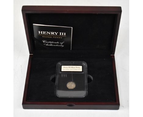 A Henry III (1216-1272) silver penny, encapsulated in a Perspex display case, with descriptive panel, in Royal Mint presentat