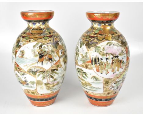 A pair of late 19th/early 20th century Japanese Satsuma porcelain vases of baluster form and flared dish neck, the body decor