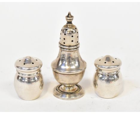 A George VI hallmarked silver miniature pepper pot, Jones &amp; Crompton, Birmingham 1945 and a pair of Elizabeth II hallmark