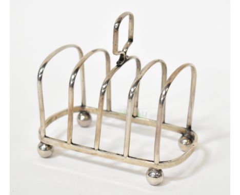 A George V hallmarked silver five-division toast rack, Haseler &amp; Bill, Chester 1922, approx 2.49ozt.