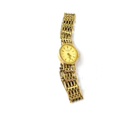 ROTARY; a ladies' vintage 9ct gold quartz wristwatch, on a 9ct gold rope twist gate bracelet strap. CONDITION REPORT Not curr