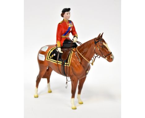 BESWICK; a model of H.M. Queen Elizabeth II Mounted on Imperial Trooping the Colour 1957, height 26cm, length 25cm.