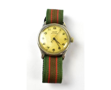 TISSOT; a gentlemen's vintage 'Militar' stainless steel wristwatch, the silvered dial set with Arabic numerals, in a stainles