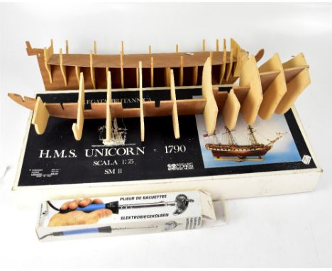 Two boxed Corel wooden model ships, H.M.S. Unicorn SM11 and Berlin SM29, a partially completed model ship and a boxed Piegali