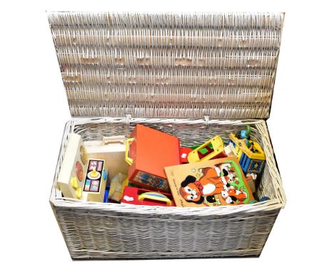 A large white painted wicker hamper containing a large quantity of mainly vintage Fisher Price children's toys to include cir