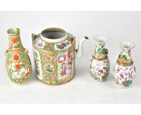 A group of four late 19th/early 20th century Chinese ceramics, a pair of baluster vases in the Famille Rose palette, with han