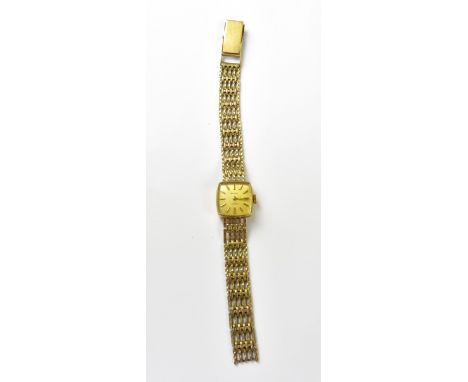 ACCURIST; a ladies' vintage wristwatch with square head, the gold-coloured square dial set with raised baton markers, on a 9c
