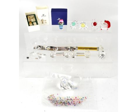 SWAROVSKI CRYSTAL; quantity of Swarovski Crystal and other items to include a miniature Champagne bottle, bucket and two glas