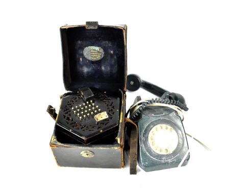 A vintage General Electric Company Ltd teal green telephone, no.746 GEN 73/1 and a boxed early 20th century ebonised concerti