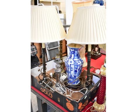 Four various table lamps comprising a silver-plated converted candlestick, a Chinese blue and white modern vase converted to 