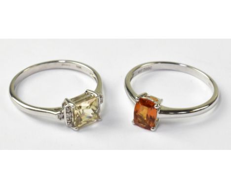 Two 10ct white gold ladies' dress rings, one set with orange emerald cut stone, one with green emerald cut stone with tiny di