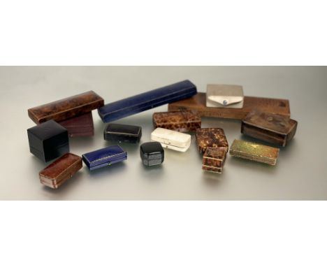 A vintage collection of jewellery boxes to include: a Harrods of London bar brooch box,a H Hallipike Ltd London and a Henry T