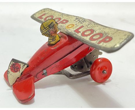 Vintage toys, a Japanese mechanical tin plate aeroplane 'The Loop Loop', probably by C.K. Toys (l- 10cm)