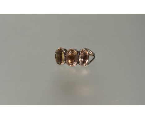 A 19thc rose metal citrine three stone ring mounted in rubover setting each stone approximmately .75ct K 1.83g&nbsp;
