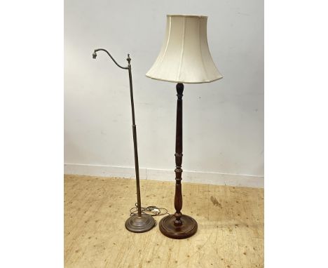 A modern cast brass adjustable floor lamp (h. 150cm) and a fluted beech framed floor lamp with silk lined shade (h.173cm) (2)